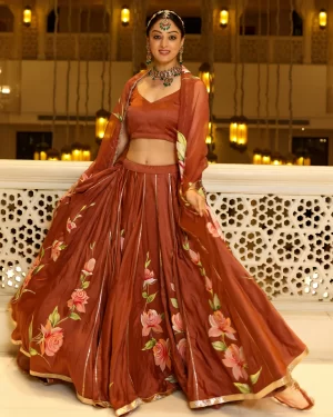 GLAZED GINGER HANDPAINTED LEHENGA SET.